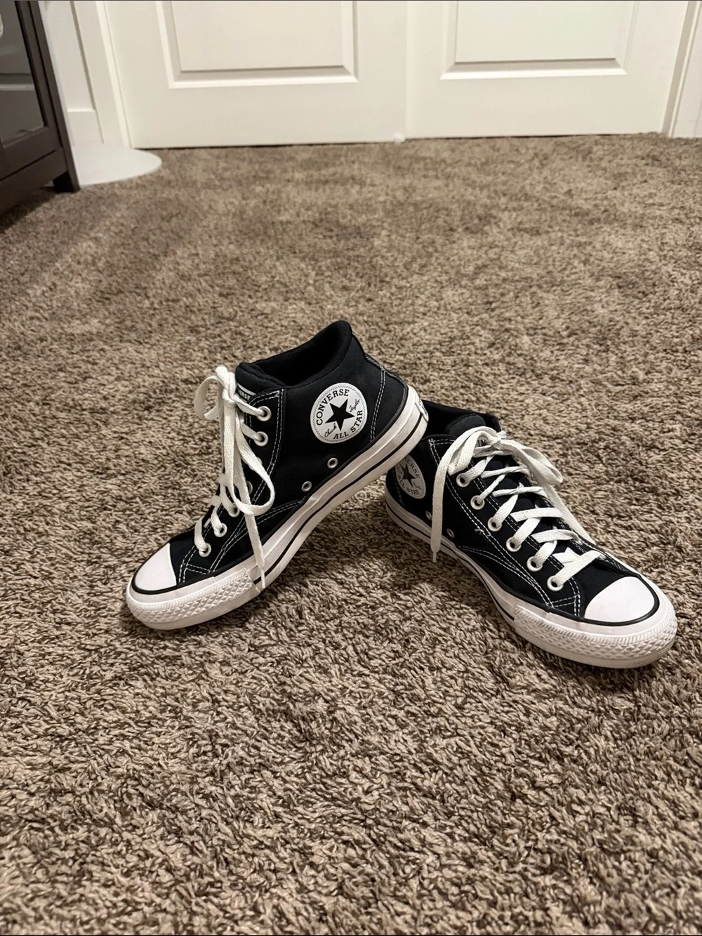 Converse Black & White Hi Top Chuck Taylor Sneakers